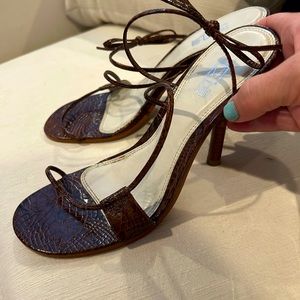 Super sexy straps heels. Excellent condition only worn once.